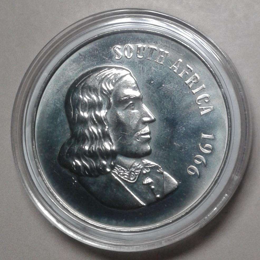 Encapsulated 1966 English proof 50c (mintage: 25000)