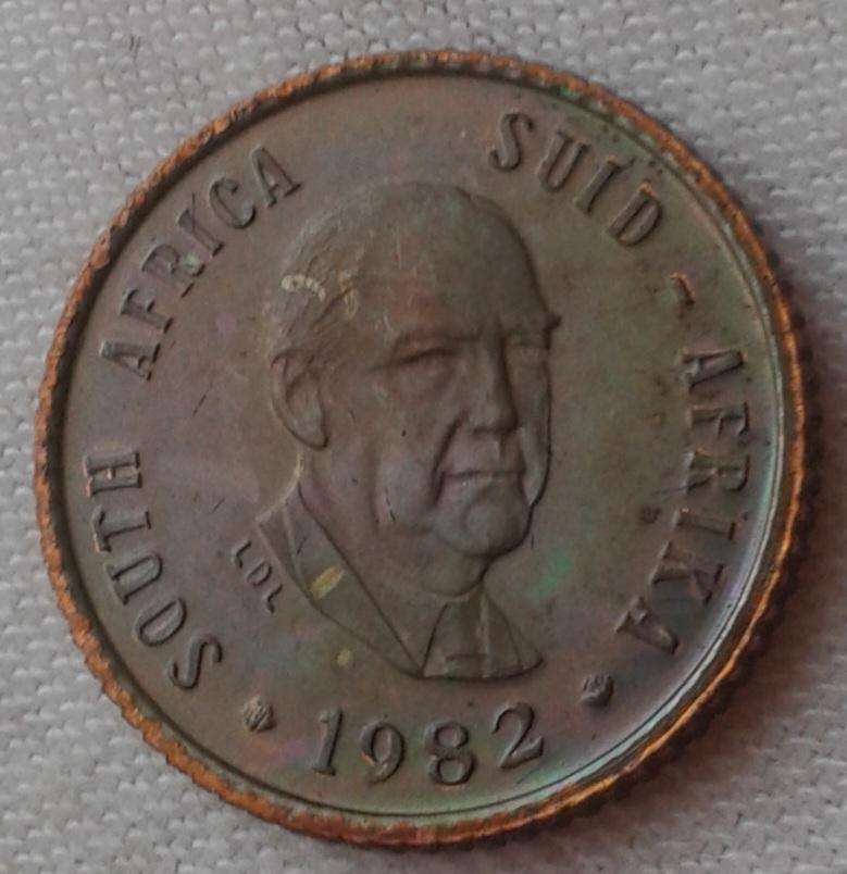 Encapsulated 1982 Republic proof 1/2c (mintage: 12000).