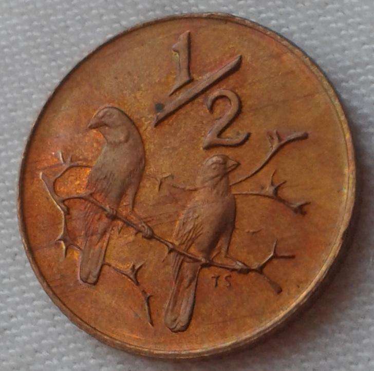 Encapsulated 1983 Republic proof 1/2c (mintage: 14135).