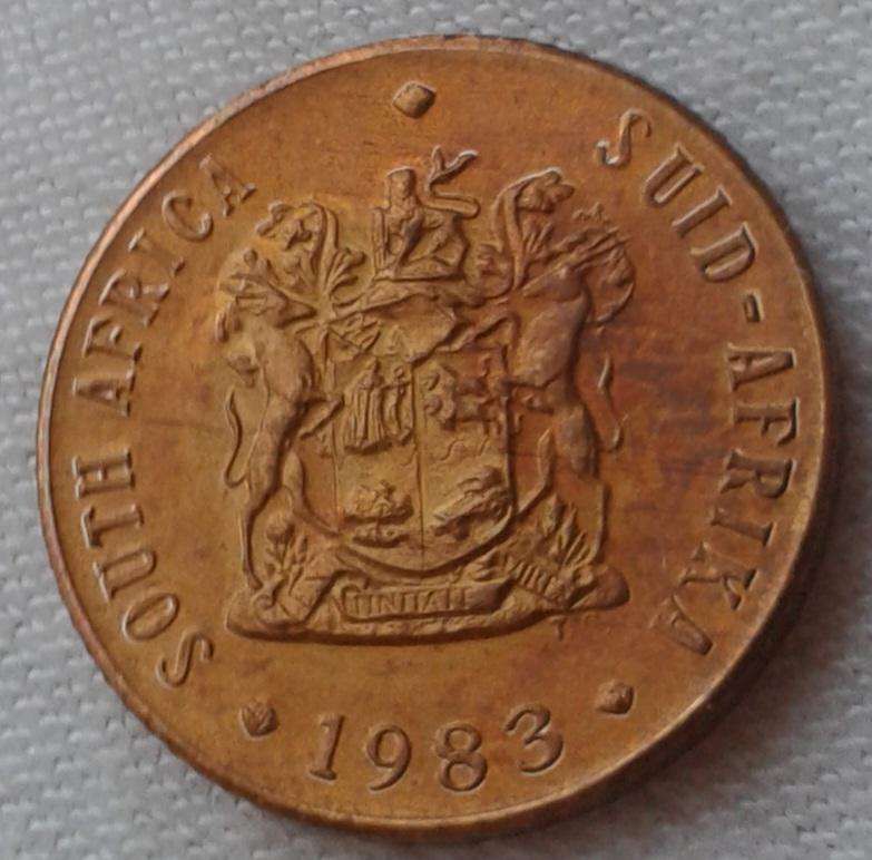 Encapsulated 1983 Republic proof 1/2c (mintage: 14135).