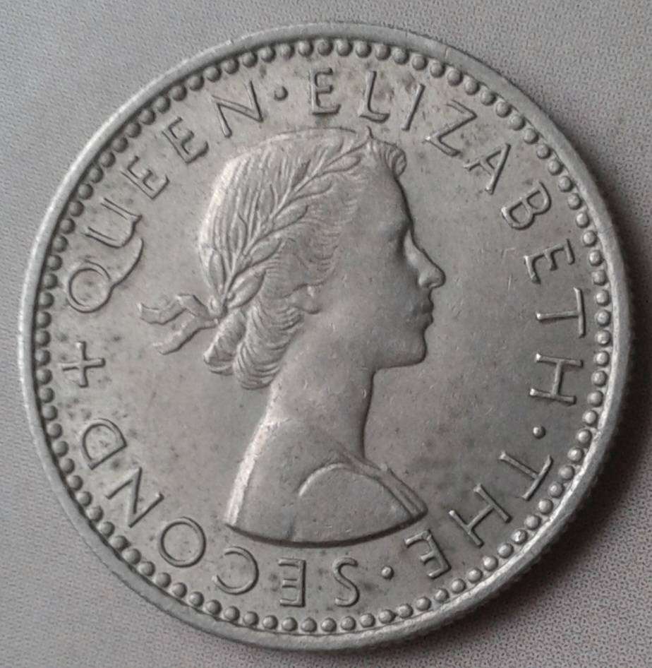 Decent 1957 Rhodesia & Nyasaland sixpence