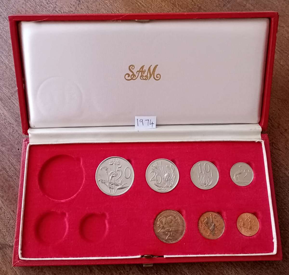 Partial 1974 proof set in red box (50c-1/2c).