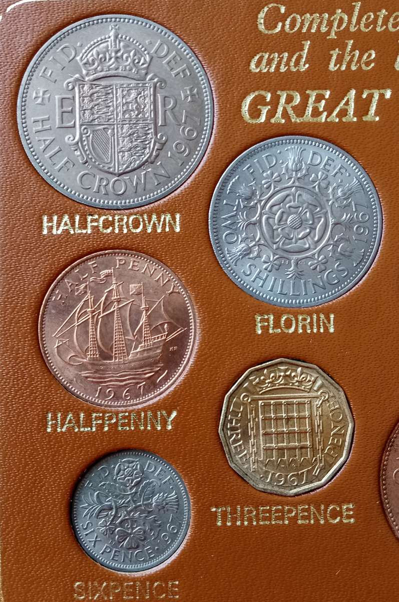 Great Britain Complete Decimal Issue & last £.s.d issue uncirculated  set in case (12 coins)