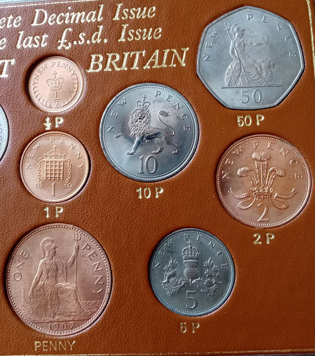Great Britain Complete Decimal Issue & last £.s.d issue uncirculated  set in case (12 coins)