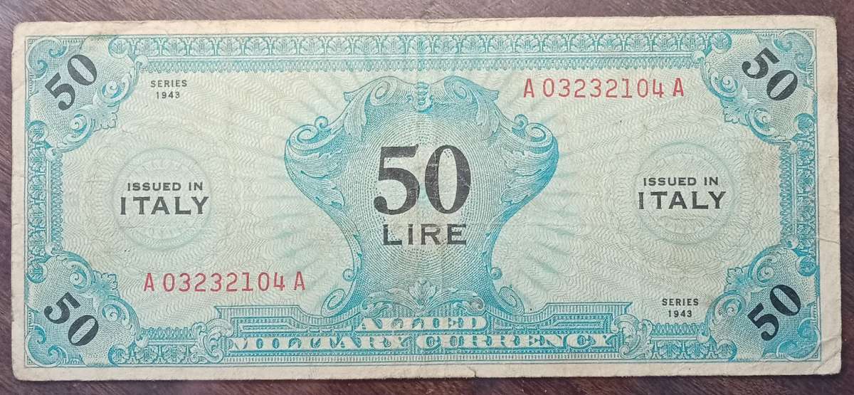 1943 WW2 Italy 50 Lire note in hard plastic sleeve (Allied Military Currency)