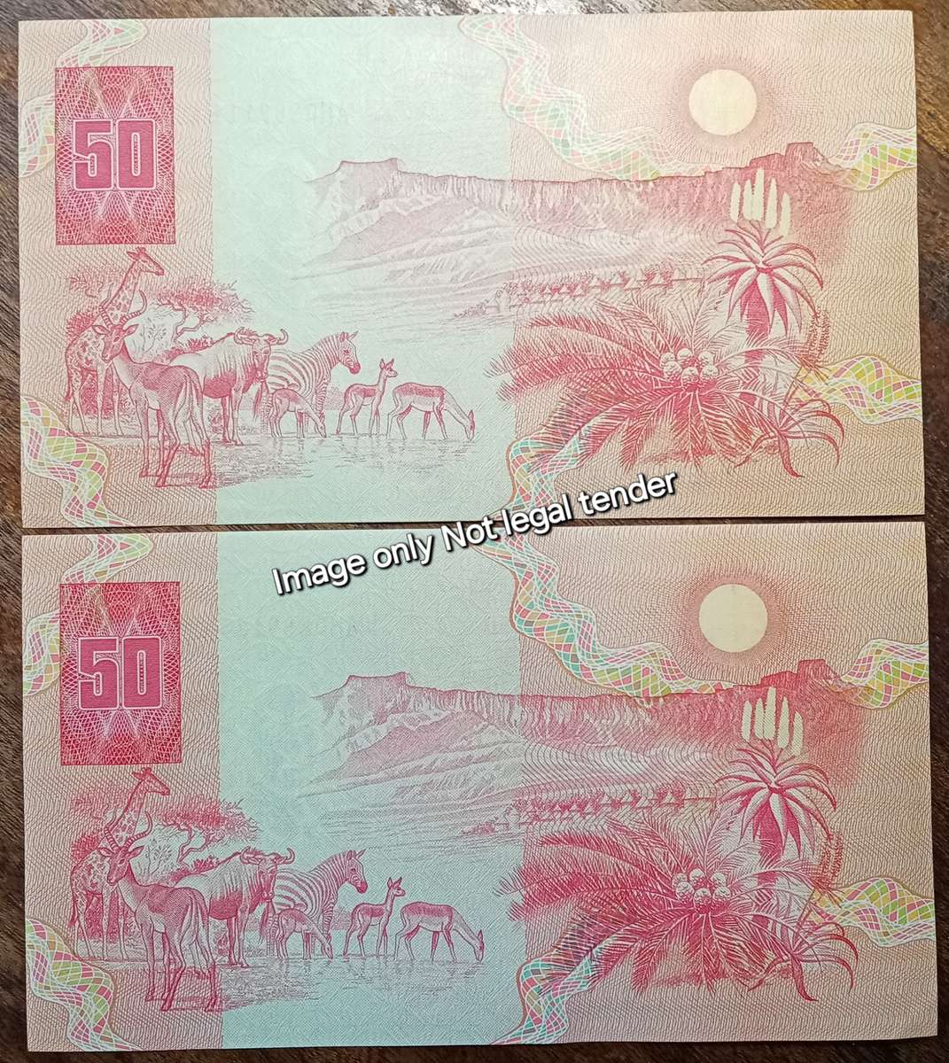Set of two 1990 CL Stals R50 notes in crisp AU+ with close serials