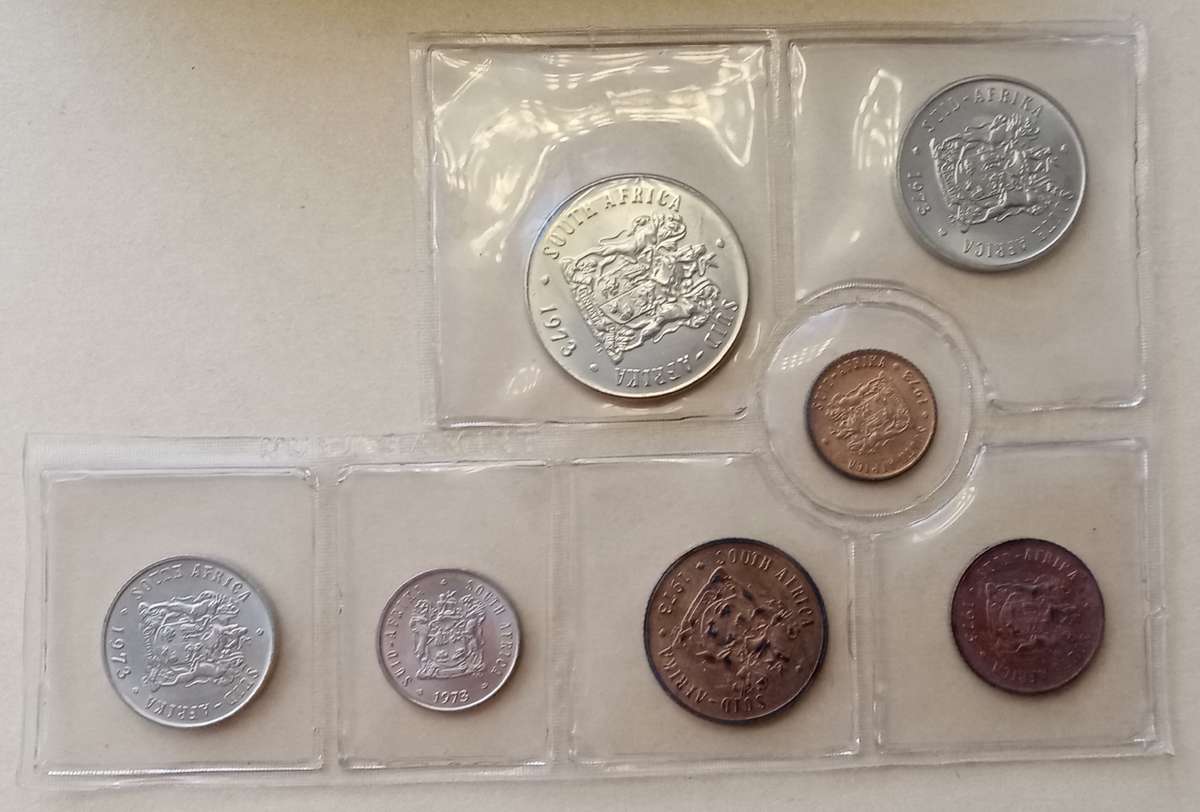 Partial 1973 uncirculated Mint pack (50c-1/2c) with scarcer 1/2c