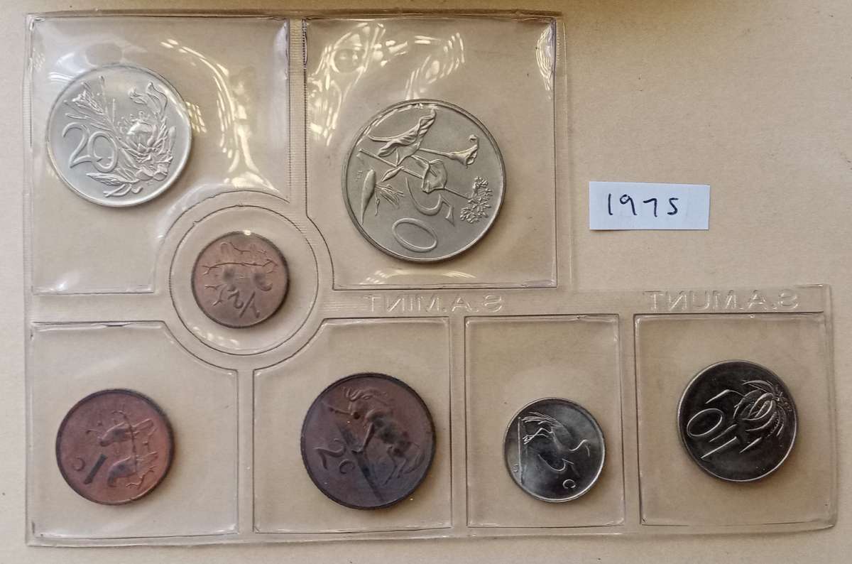 Partial 1975 uncirculated Mint pack (50c-1/2c) with scarcer 1/2c