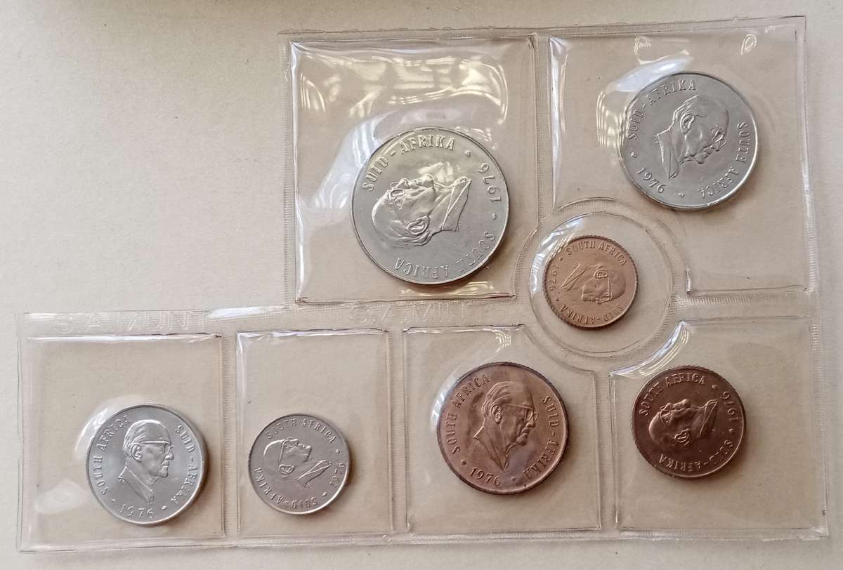 Partial 1976 uncirculated Mint pack (50c-1/2c) with scarcer 1/2c