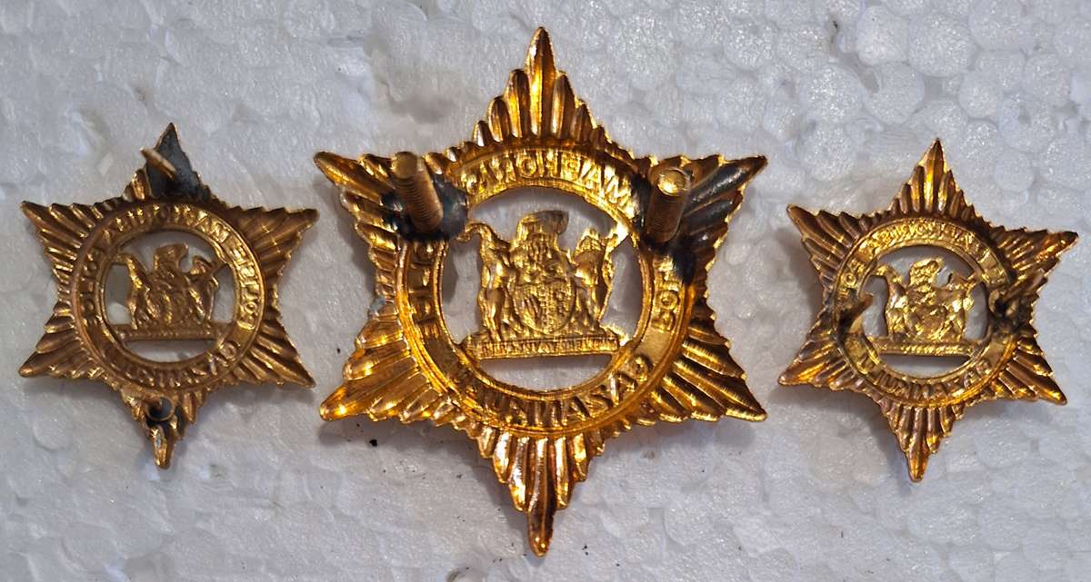 GAZANKULU POLICE CAP AND COLLAR BADGES SET - SCREWS AND PINS INTACT