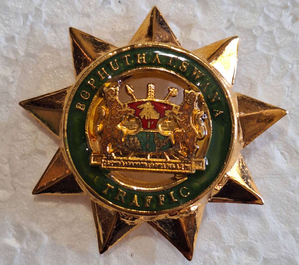 BOPHUTHATSWANA TRAFFIC POLICE CAP BADGE - SCREWS INTACT