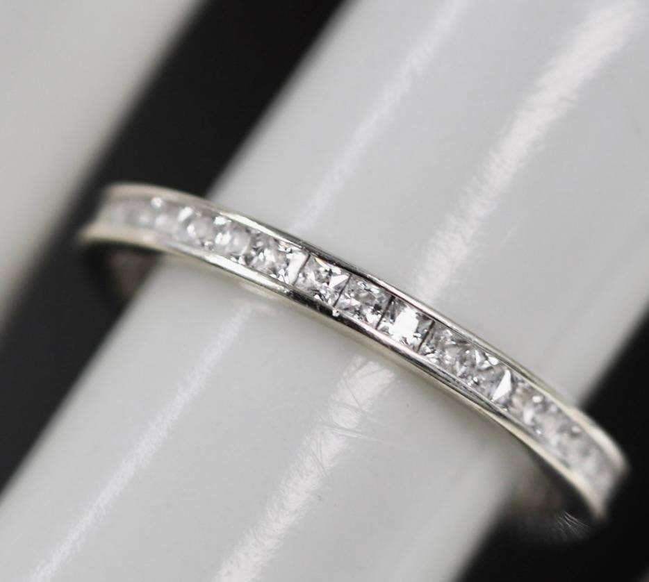 9ct  WHITE GOLD CHANNEL SET CUBIC ZIRCONIA ETERNITY RING. LONDON, ENGLAND HALLMARKED