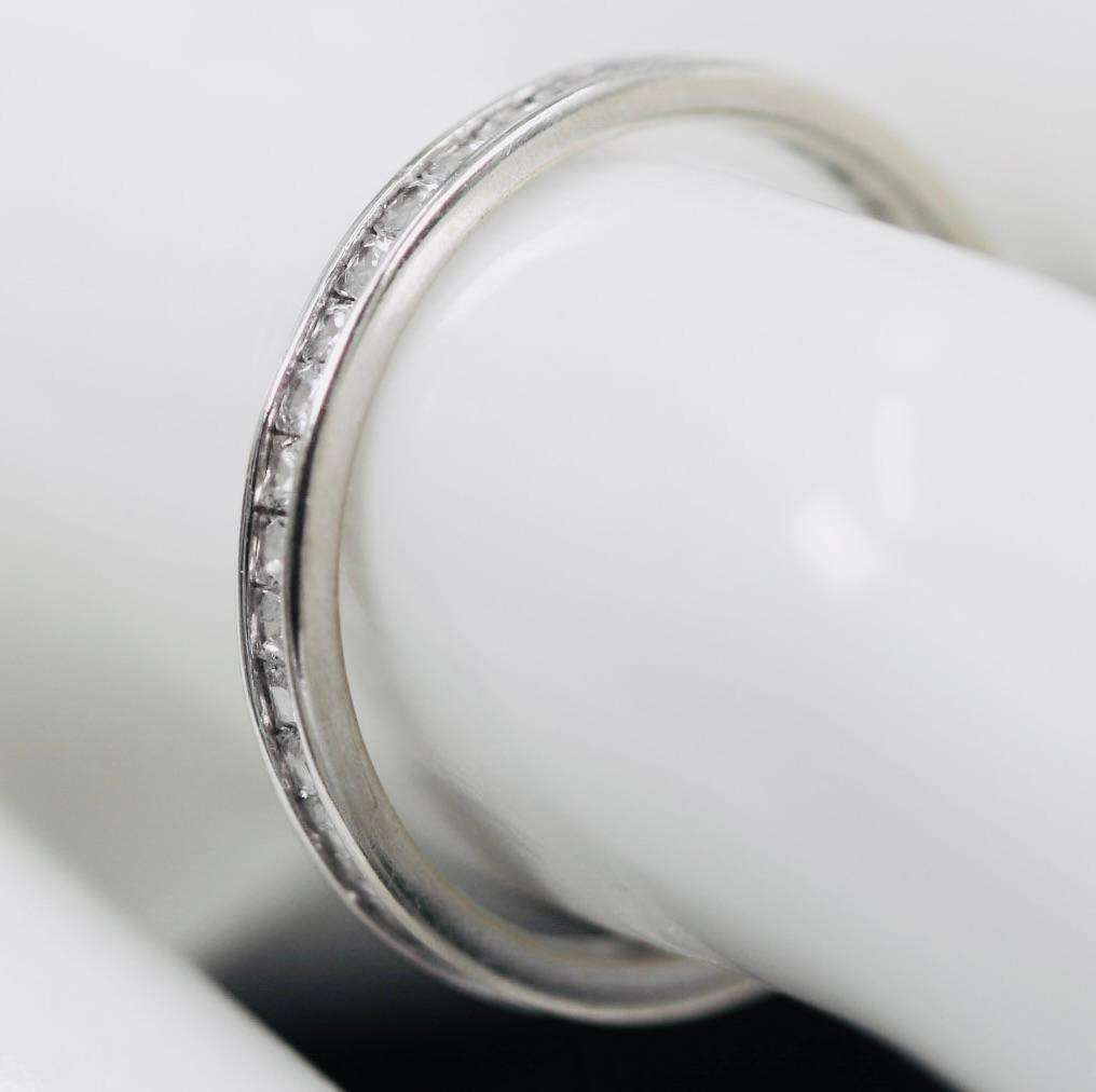 9ct  WHITE GOLD CHANNEL SET CUBIC ZIRCONIA ETERNITY RING. LONDON, ENGLAND HALLMARKED