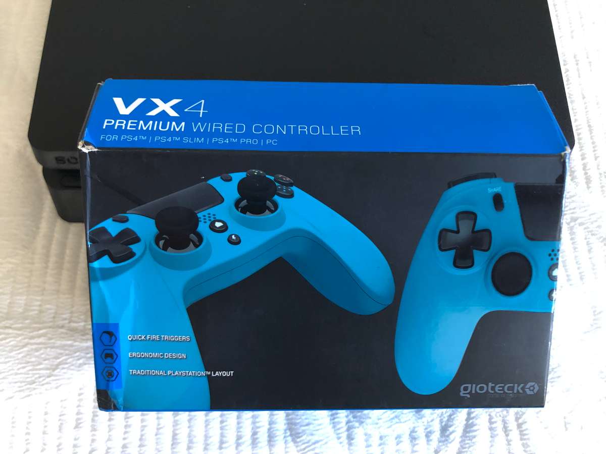 PS4 Slim 500GB With 2 Controllers & 2 Games Great Condition!