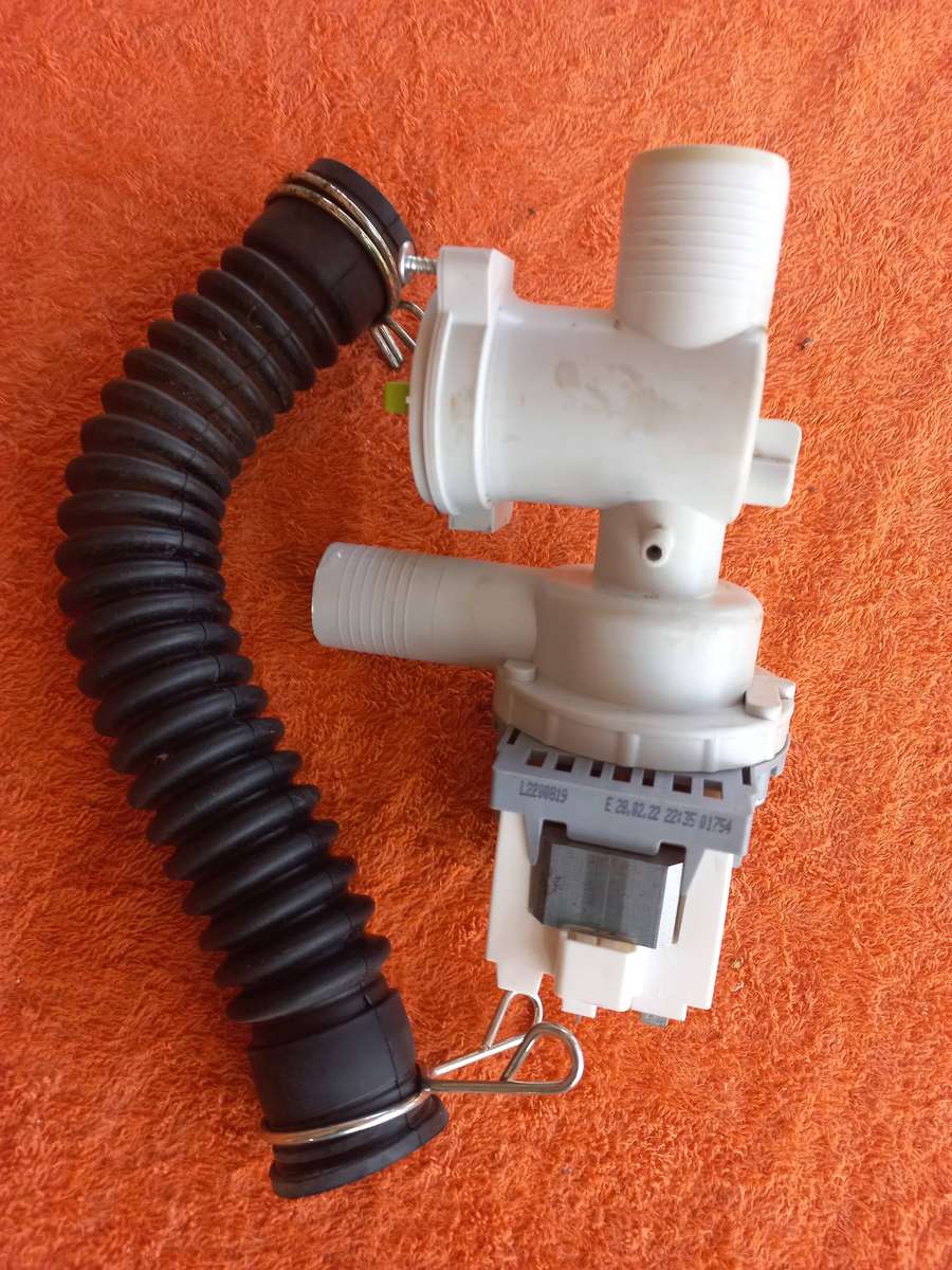Whirlpool top loader washing machine drain pump assembl & drum to pump hose - Fit model WTL1300SL