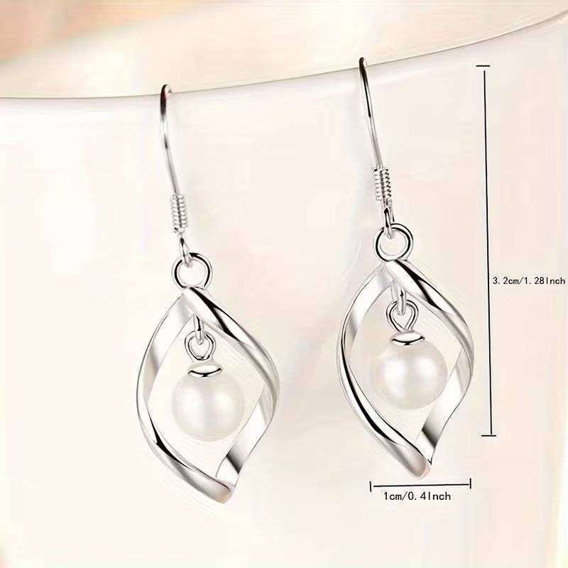 Fashionable Twisted Drop Earrings        198