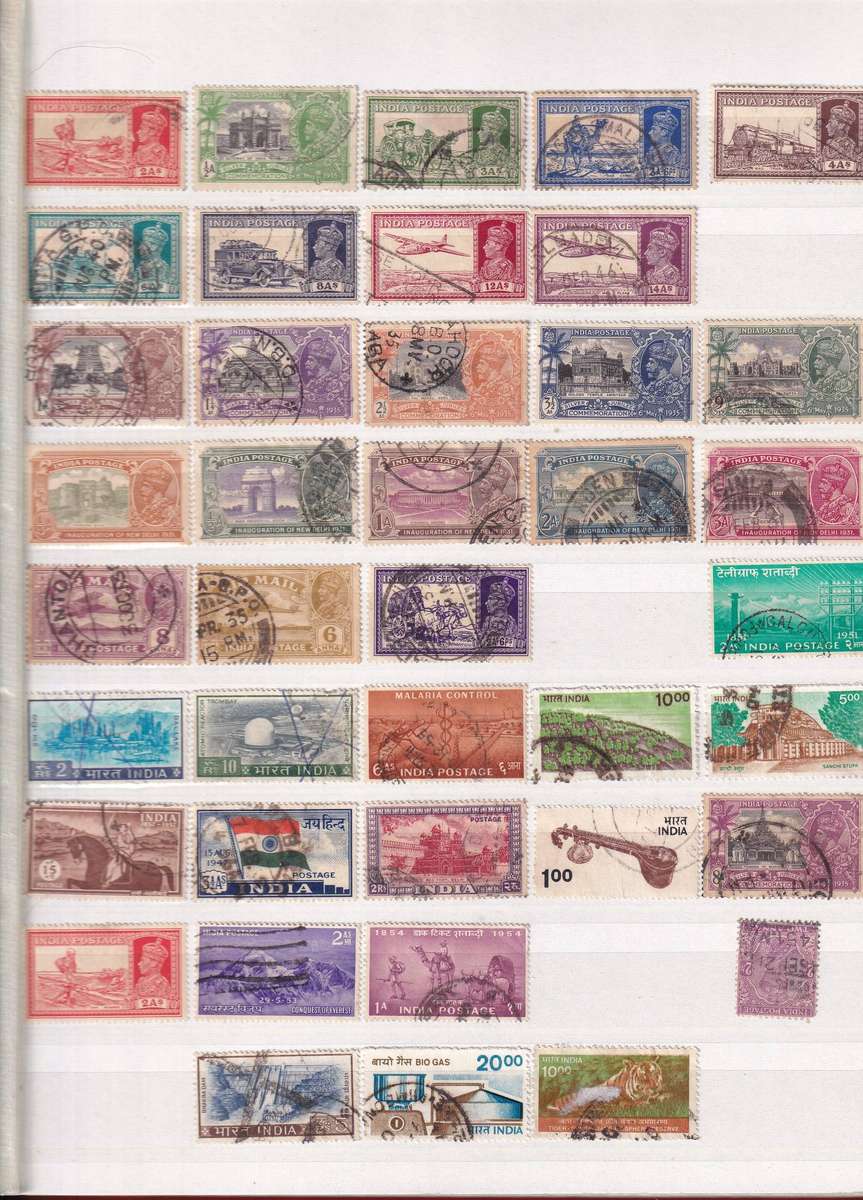 Red 15 page album with India stamps , M/H & used          ( good used condition with faults)