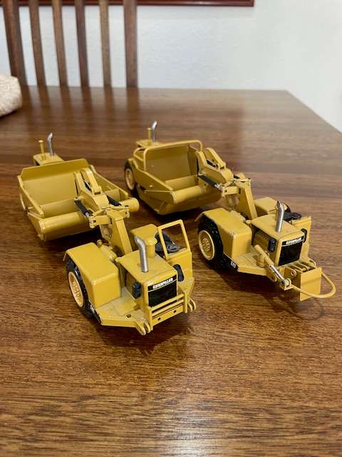 NZG Caterpillar 627 Scrapers 1:50 scale models