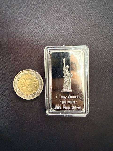 NOVELTY ITEM - Silver plated "1 Troy ounce 100 Mills .999 fine silver" bar