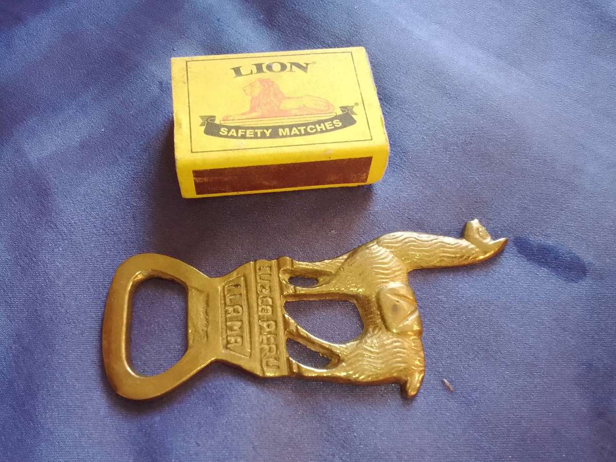 Brass bottle opener.  Peru.