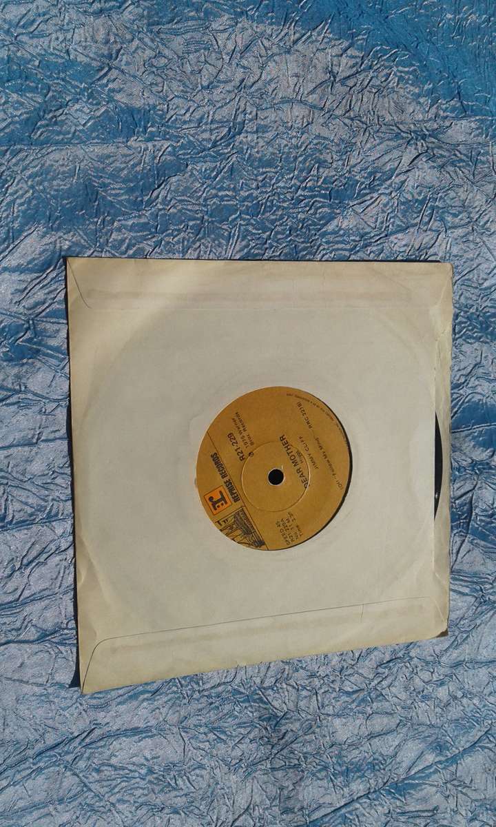 Vinyl 7` single.  No Woman No Cry.  Jimmy Cliff.  VG+ VG