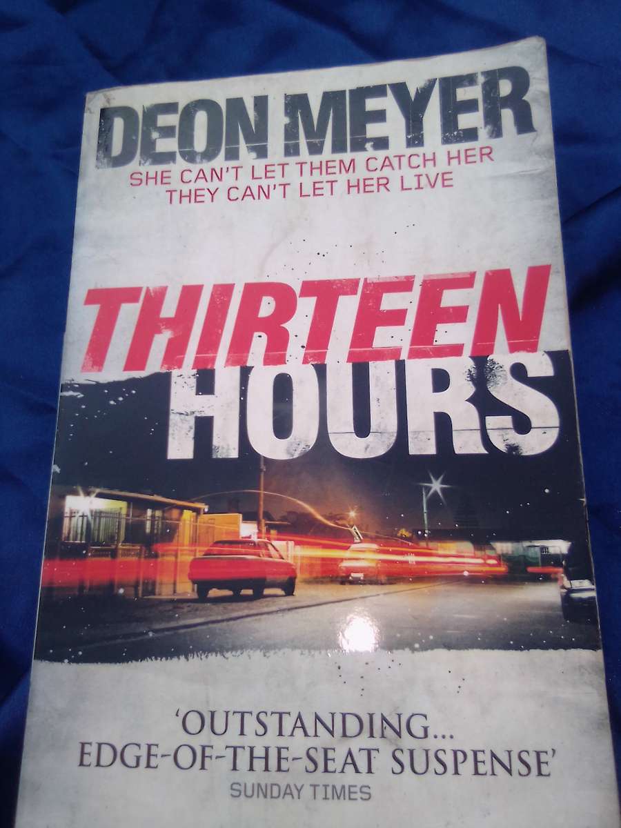 "Thirteen Hours"  Deon Meyer.  Soft cover.