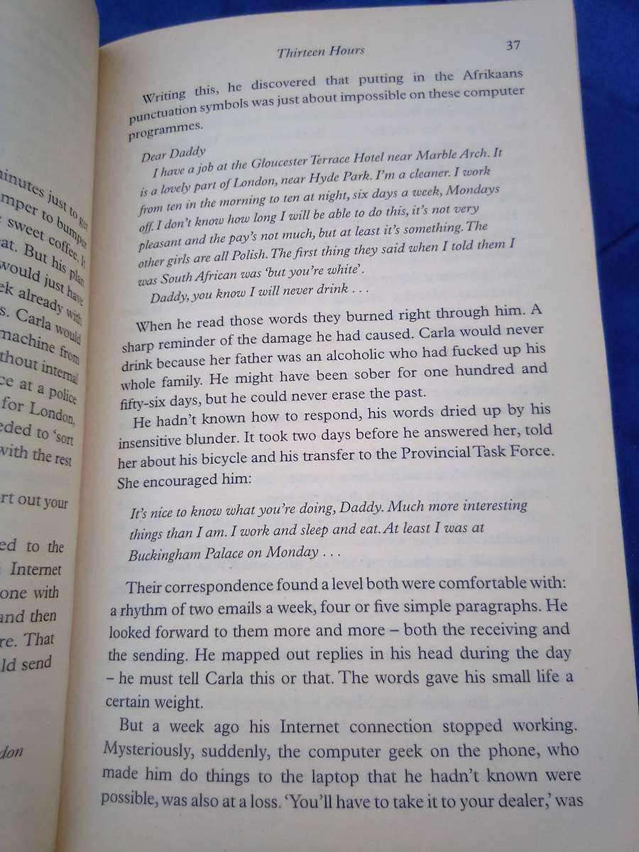 "Thirteen Hours"  Deon Meyer.  Soft cover.