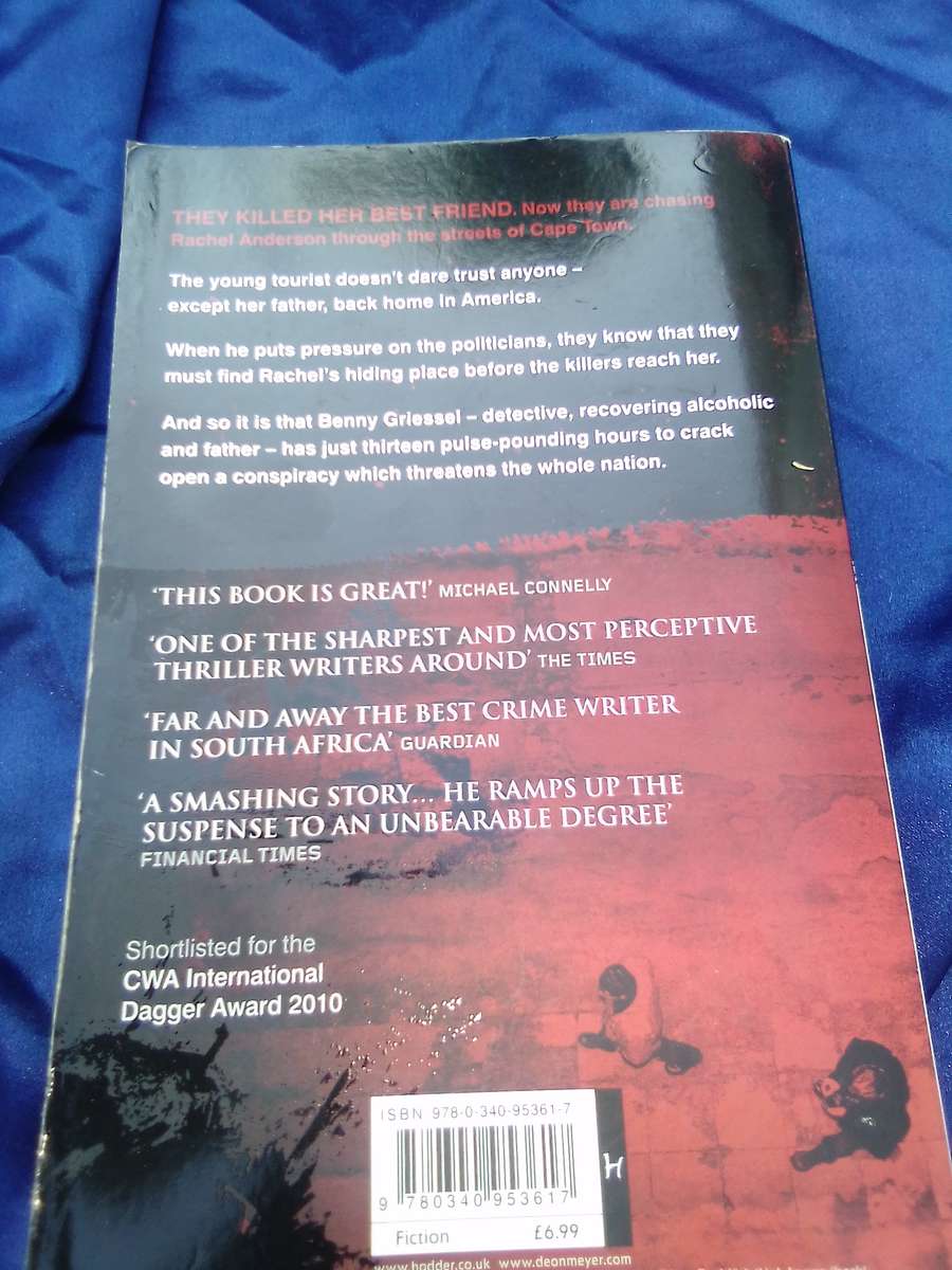 "Thirteen Hours"  Deon Meyer.  Soft cover.