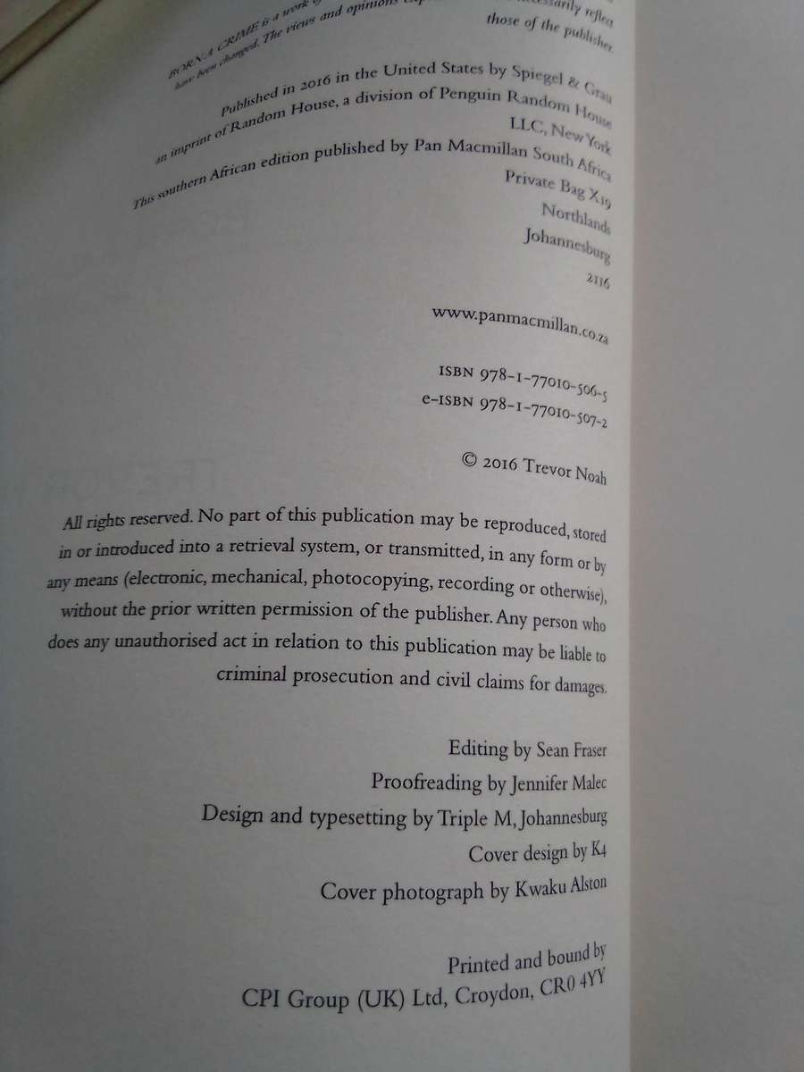 "Born a Crime`  Trevor Noah.  Soft cover.