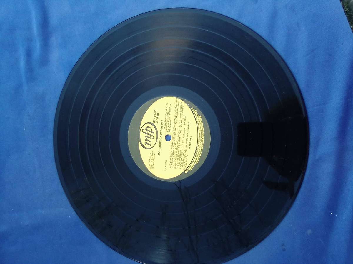 L.P. Peter Vee.   Cover: Good. L.P.:Very good.