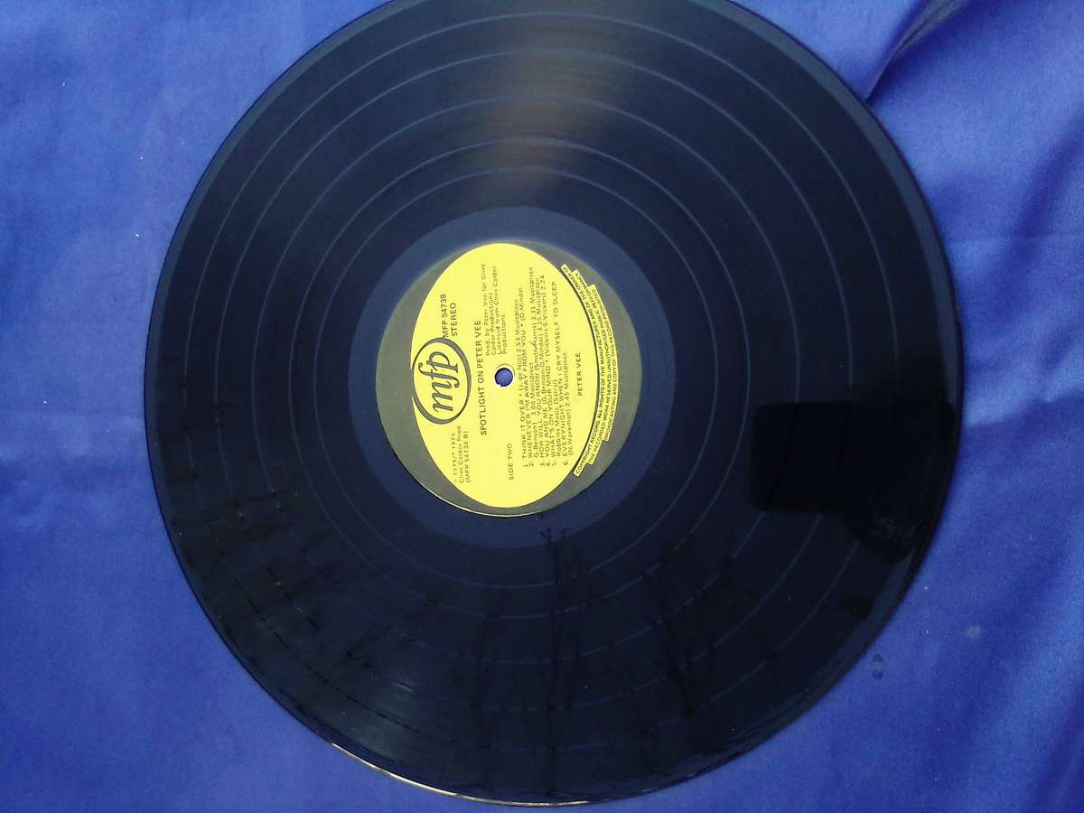 L.P. Peter Vee.   Cover: Good. L.P.:Very good.