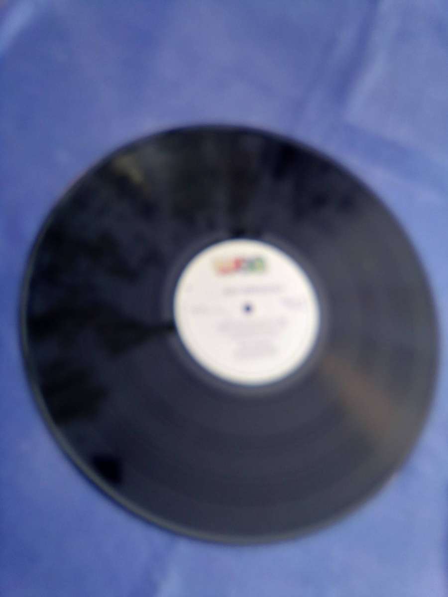 L.P. Vinyl Record.. Phil Collins.  But Seriously.   VG  VG