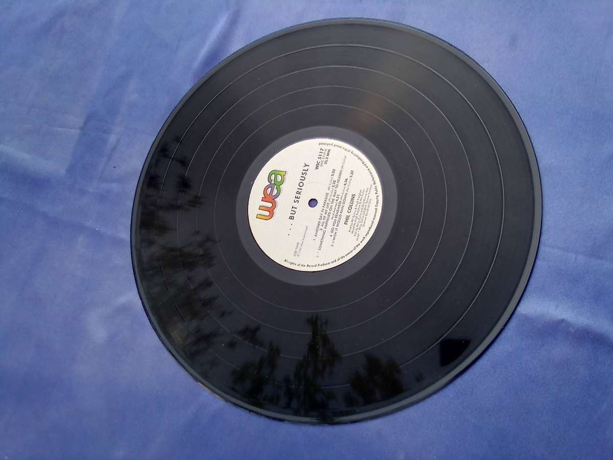 L.P. Vinyl Record.. Phil Collins.  But Seriously.   VG  VG