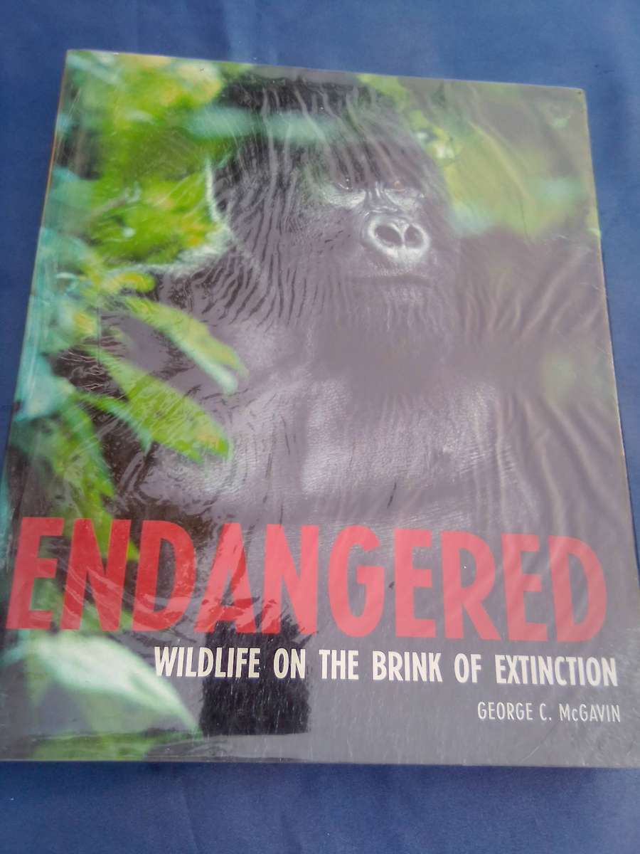 "Endangered". Wildlife on the brink of Extinction.   Hard cover.