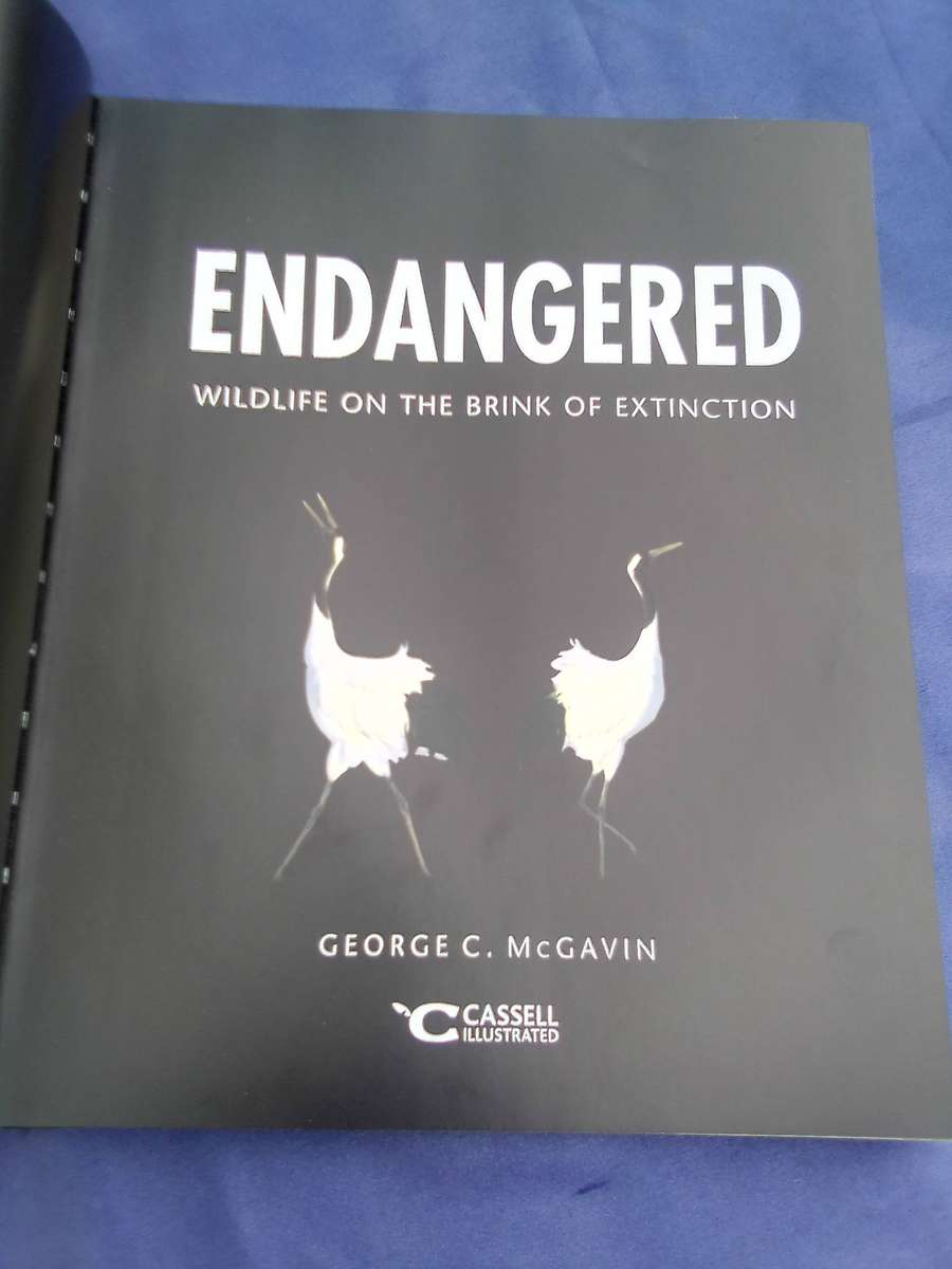 "Endangered". Wildlife on the brink of Extinction.   Hard cover.