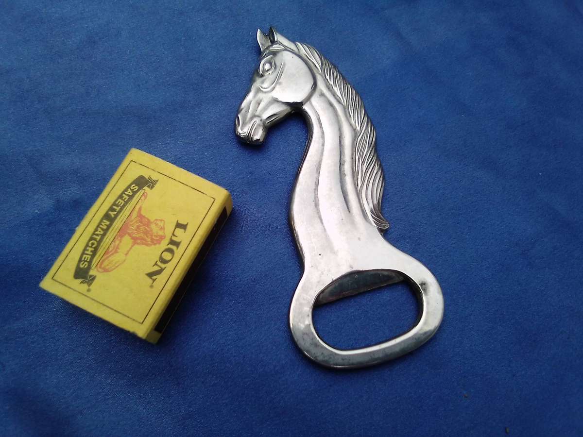Horse - head, shaped bottle opener.