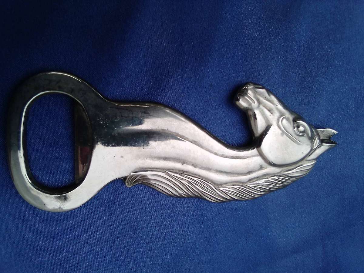 Horse - head, shaped bottle opener.