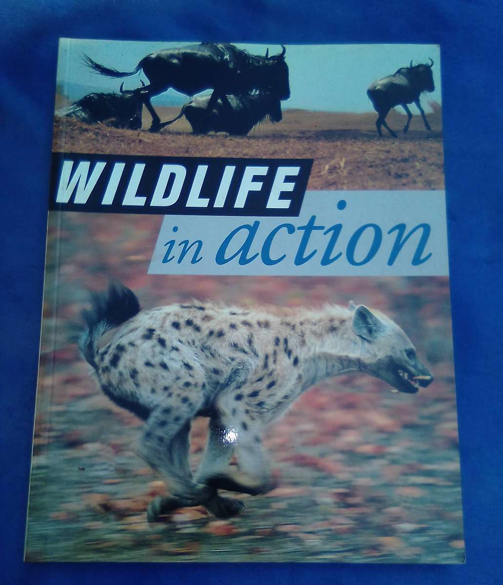 "Wildlife in Action"  Soft cover.