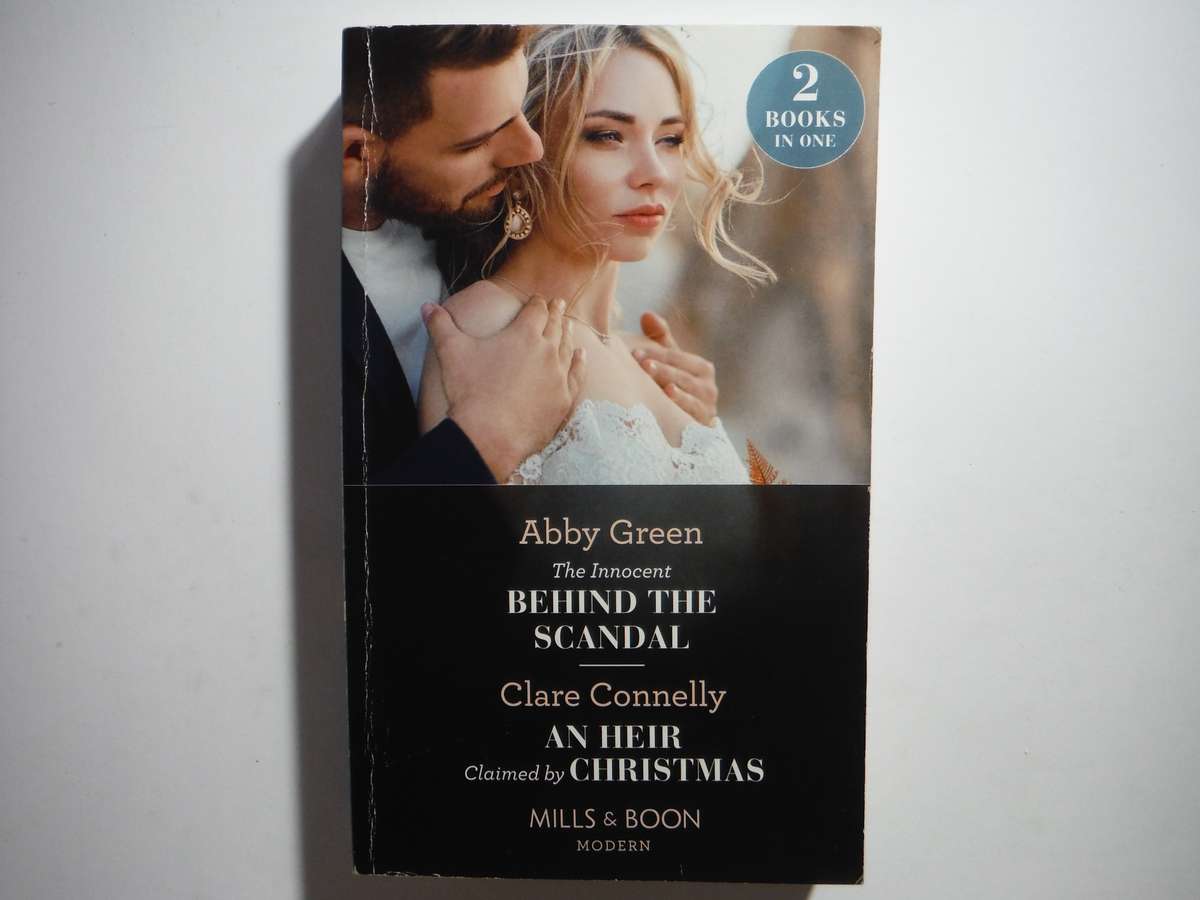 Mills & Boon 2 in 1 - Paperback - The Innocent Behind the Scandal and An Heir Claimed by Christmas