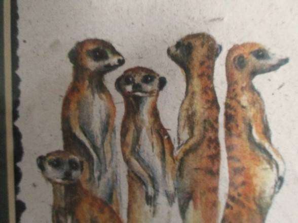 Charming Meerkat family on hand made dung paper framed in naturally foraged genuine Yellowwood frame