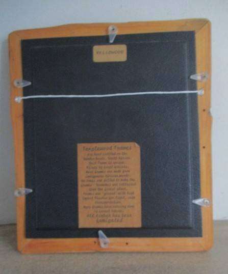 Charming Meerkat family on hand made dung paper framed in naturally foraged genuine Yellowwood frame