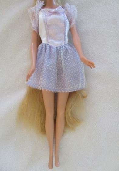 A Mattel Barbie with gorgeous EXTRA long - knees bend - great condition