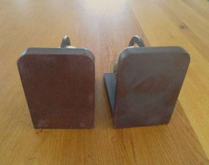 Two vintage World Globe Bookends with metal globes depicting antique maps