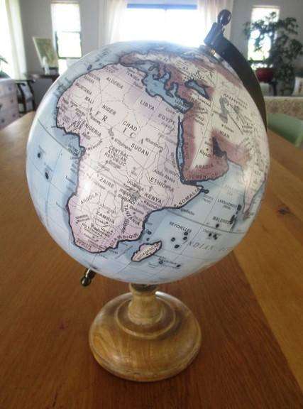 A Legend World Globe in outstanding condition - metal with wood stand