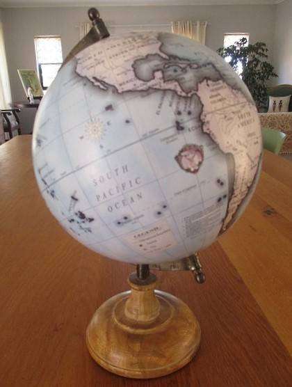 A Legend World Globe in outstanding condition - metal with wood stand