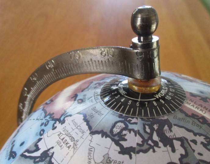 A Legend World Globe in outstanding condition - metal with wood stand