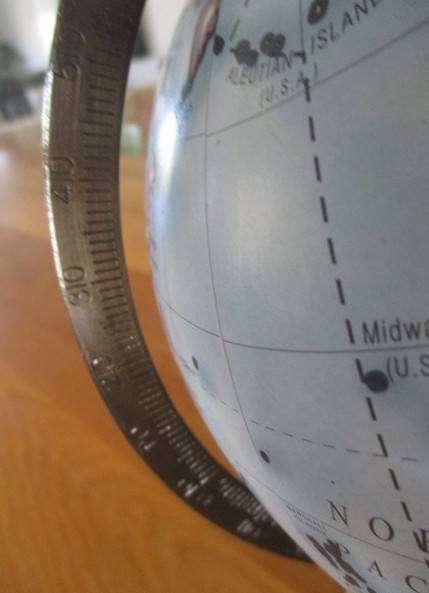 A Legend World Globe in outstanding condition - metal with wood stand