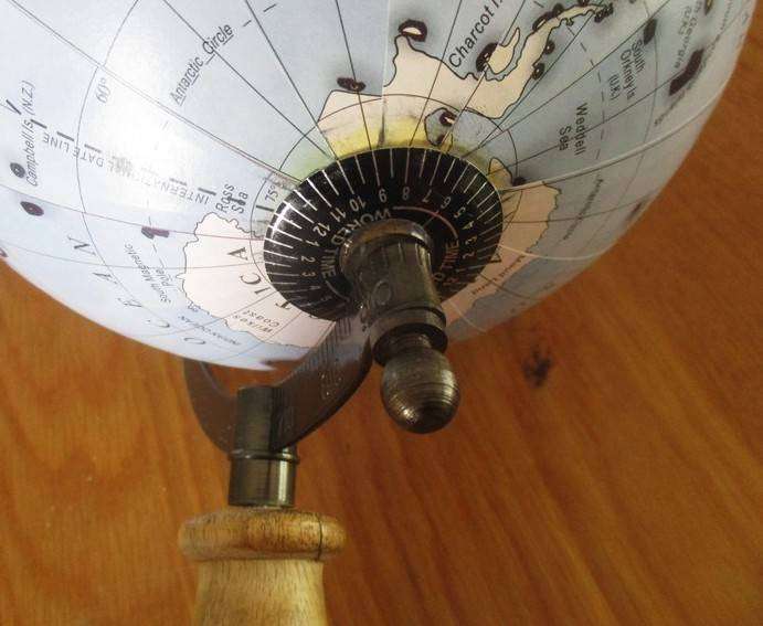 A Legend World Globe in outstanding condition - metal with wood stand