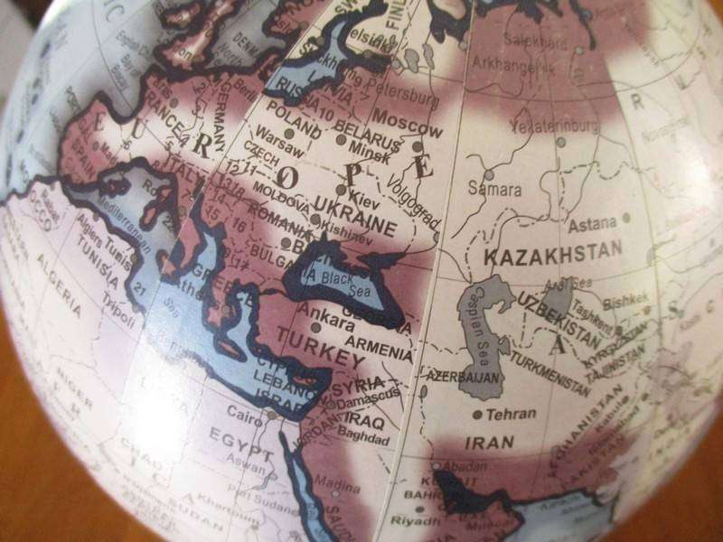 A Legend World Globe in outstanding condition - metal with wood stand