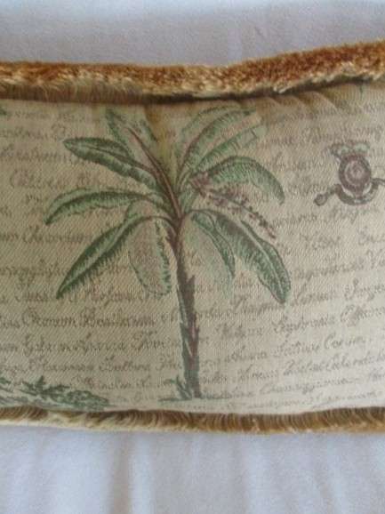 A lovely cushion made from quality woven material with fluffy border